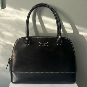 Kate Spade Purse.  Lg Black leather bag pink pokadots inside. Great condition.